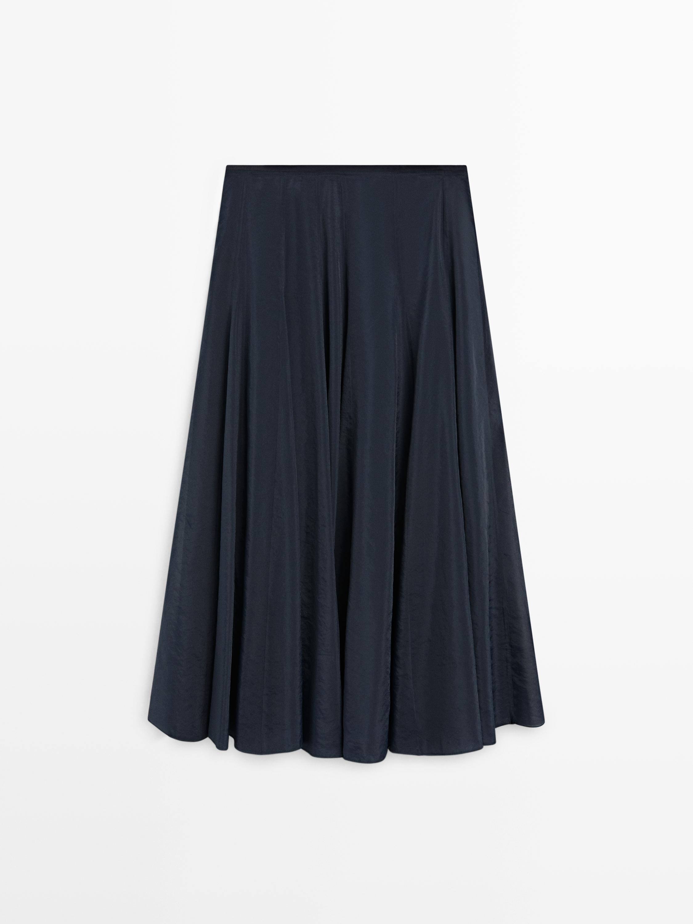 Jupe midi à plis nervurés